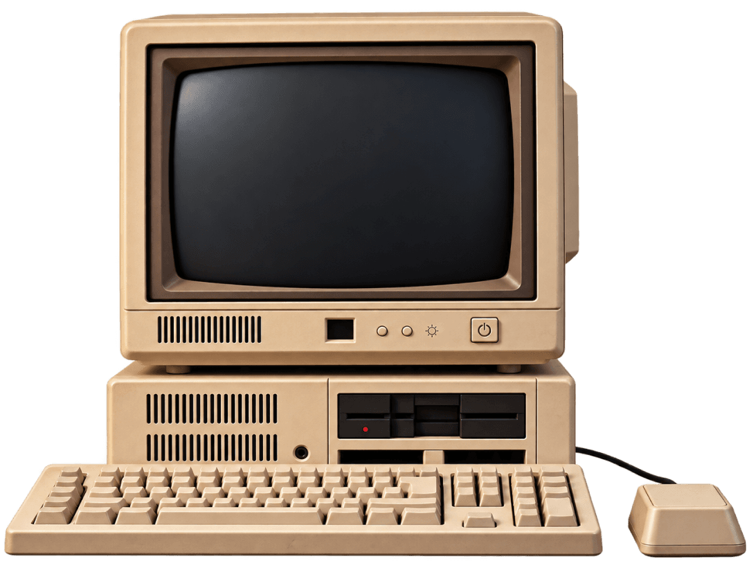 A beige retro computer with keyboard and mouse